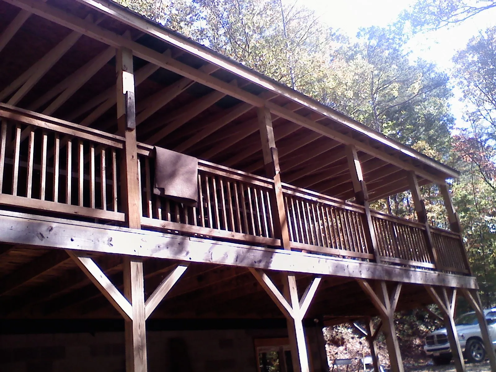 Timber framing under a new elevated porch and deck in Oakland